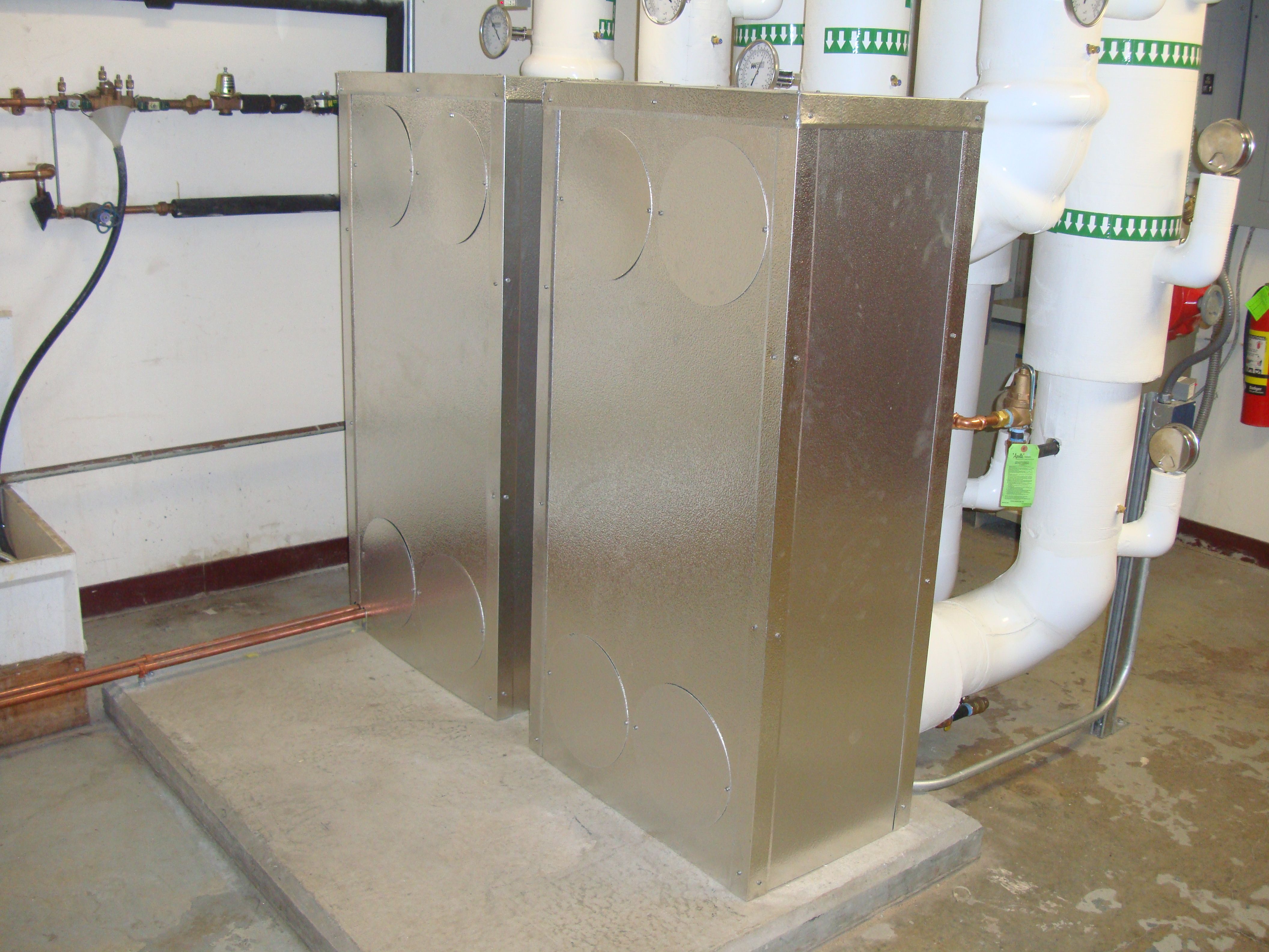 Cased exchangers with piping